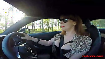 British mature Red fingers her cunt in the motor vehicle again